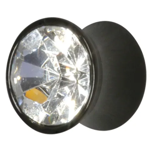 Schwarzer Acryl Plug mit klarem Kristall, runder Form, auf neutralem Hintergrund