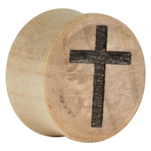 Runder Holzplug mit eingraviertem schwarzen Kreuz auf hellem Hintergrund