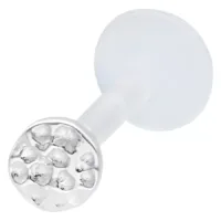 Silbernes Labret mit gehämmertem Aufsatz Silberner Labret-Piercing mit gehämmertem Aufsatz auf weißem Hintergrund
