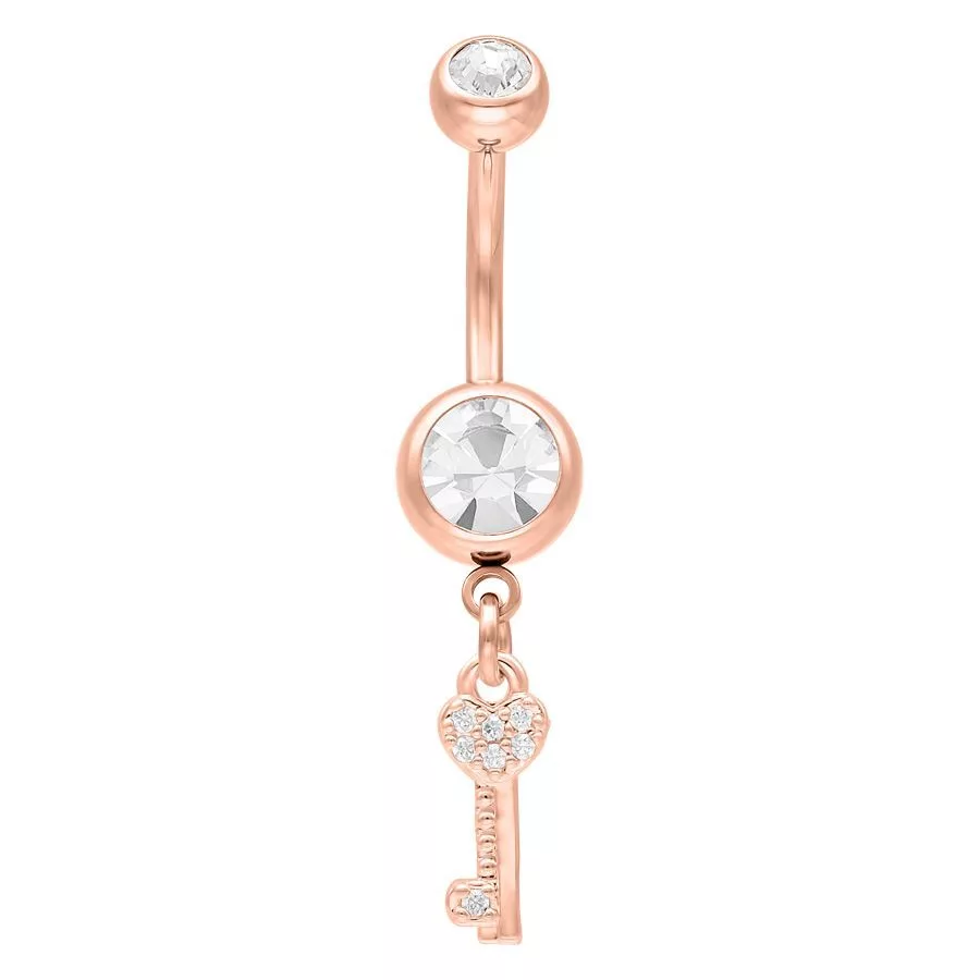 Bauchnabelpiercing mit Schlüssel-Anhänger, Roségold Roségoldenes Bauchnabelpiercing mit Kristall und Schlüssel-Anhänger auf weißem Hintergrund