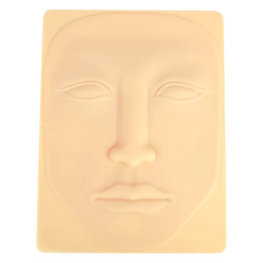 Beige Tattoo Haut Gesicht aus Silikon Beige Silikon-Tattoo-Haut in Gesichtform auf hellem Hintergrund