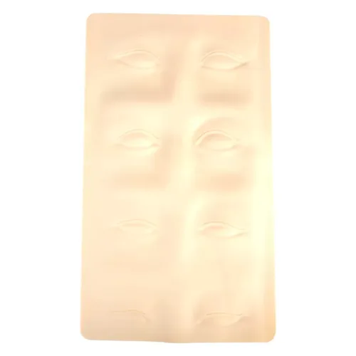 Beige Silikonplatte mit Augenbrauenkonturen auf weißem Hintergrund