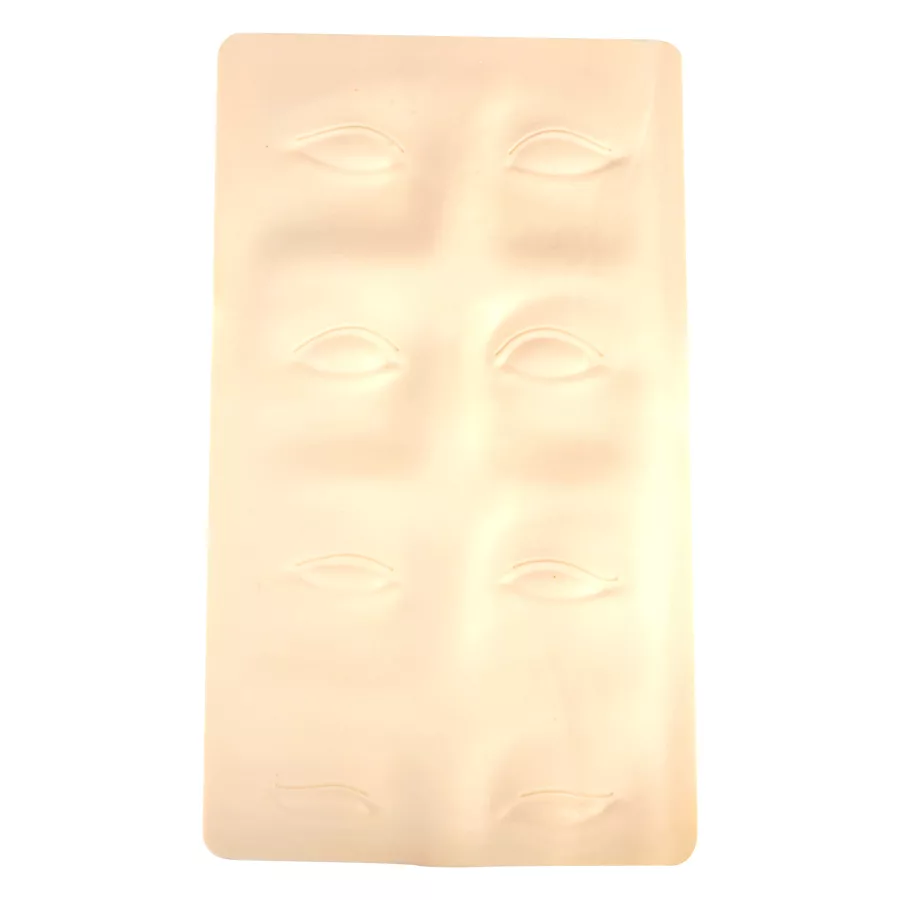 Beige Silikon Tattoo Übungshaut für Augenbrauen Beige Silikonplatte mit Augenbrauenkonturen auf weißem Hintergrund
