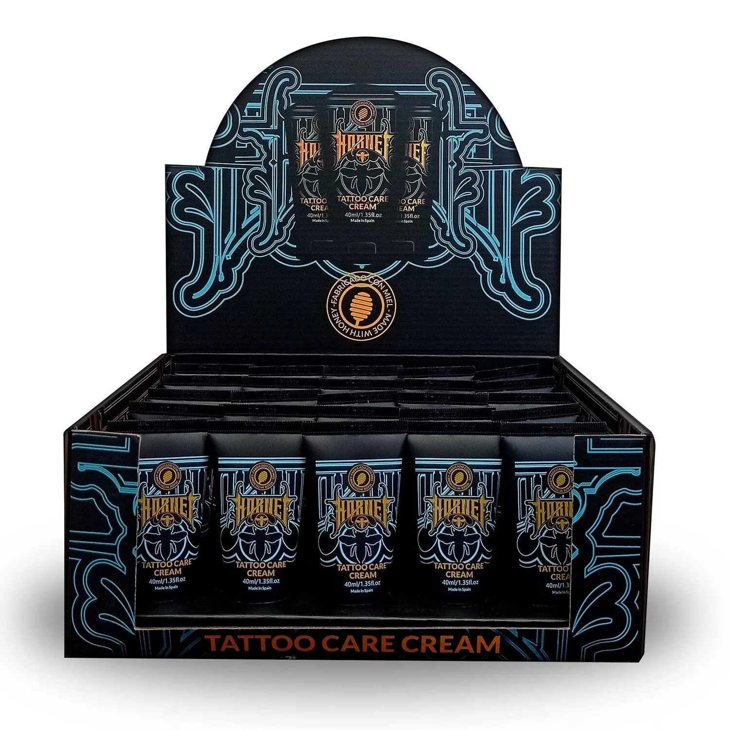 Hornet Tattoo Pflegecreme in dekorativer Box Schwarze Box mit Hornet Tattoo Pflegecreme-Tuben und blauen Verzierungen