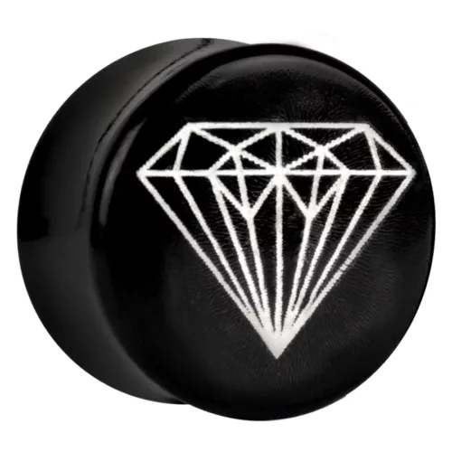 Schwarzer Plug mit weißem Diamant-Design auf neutralem Hintergrund