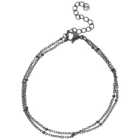 Schwarzes Doppelarmband aus Chirurgenstahl mit Perlen auf weißem Hintergrund