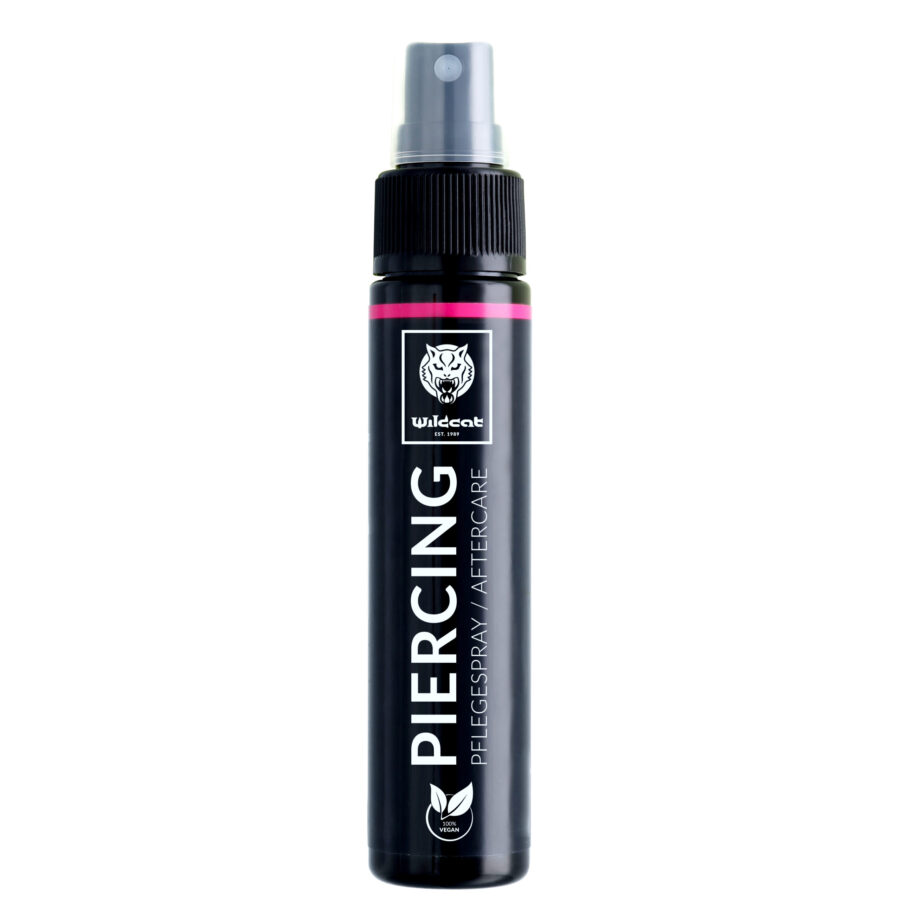 Schwarze Piercingspray-Flasche mit grauem Sprühkopf auf weißem Hintergrund