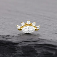 14K Gold Moissanite Aufsatz für Innengewinde Goldener Moissanite-Aufsatz mit fünf Steinen auf dunklem Hintergrund