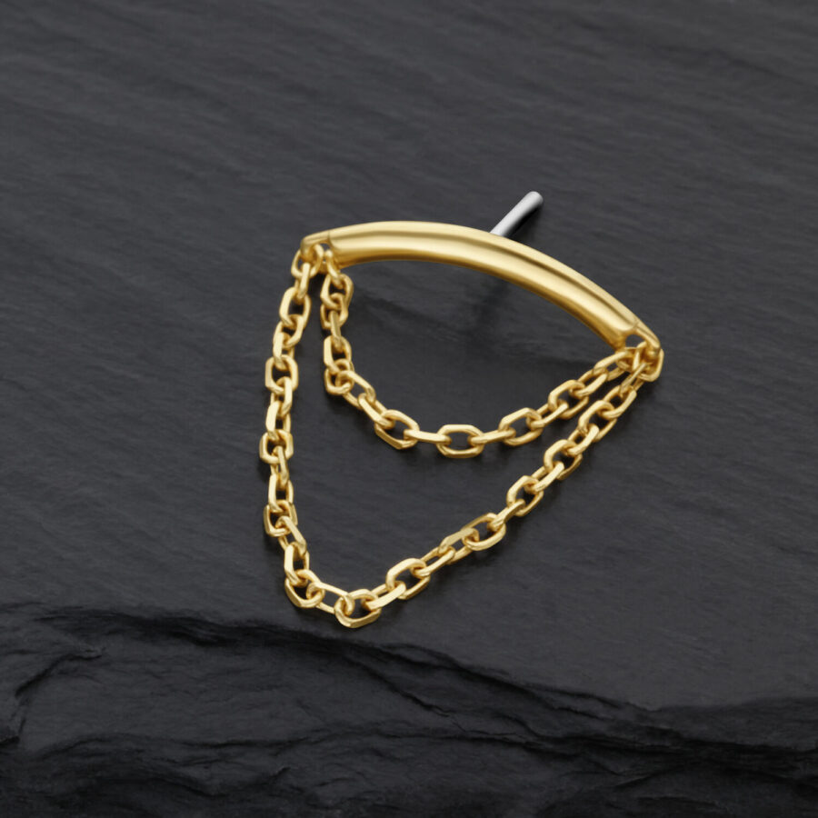 Goldener Helix Kettenaufsatz mit klaren Kristallen auf dunklem Hintergrund