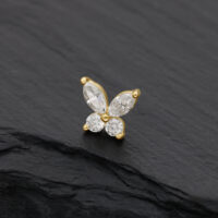14K Gold Schmetterling Aufsatz mit Moissanit Goldener Schmetterling Aufsatz mit klaren Moissanit-Steinen auf schwarzem Hintergrund