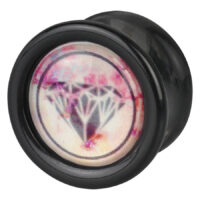 Schwarzer Plug mit Diamant-Design Runder schwarzer Plug mit rosa Diamant-Motiv auf weißem Hintergrund
