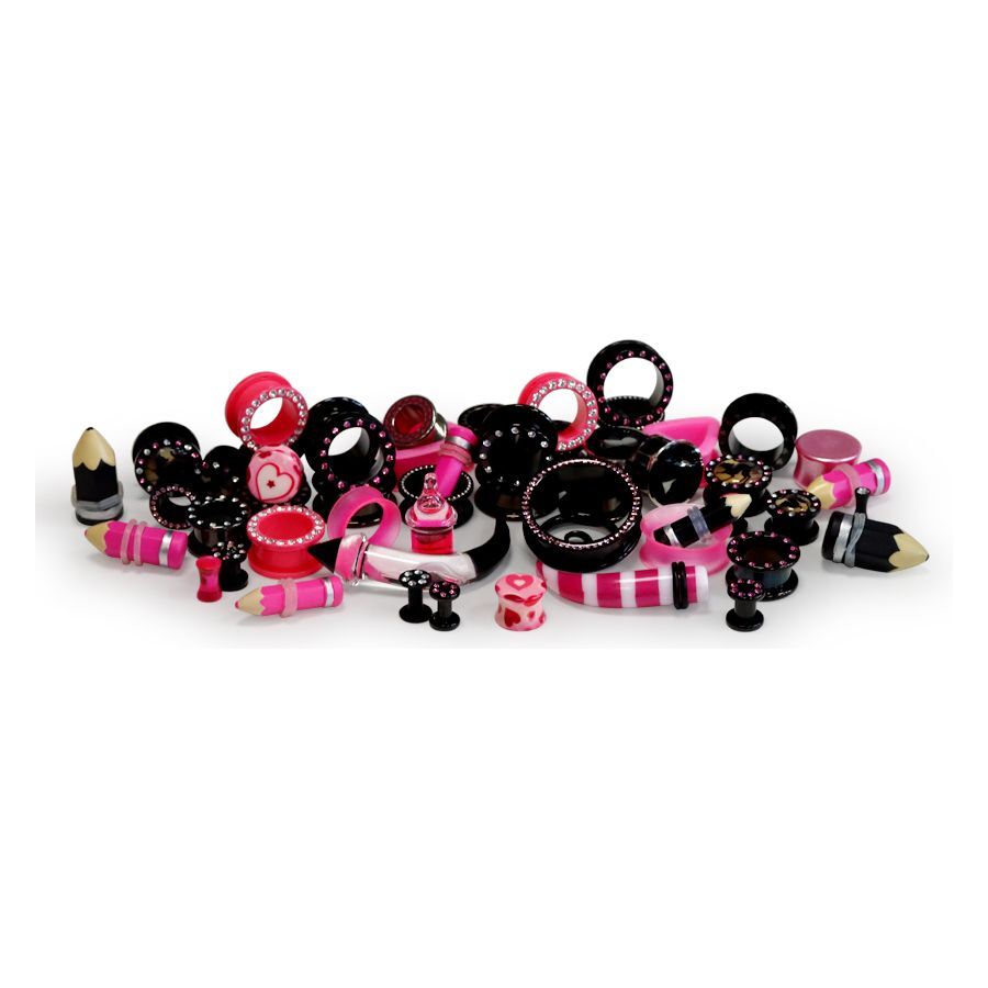 Pink und Schwarzes Piercing-Set von Wildcat Verschiedene pinke und schwarze Piercings auf weißem Hintergrund verteilt