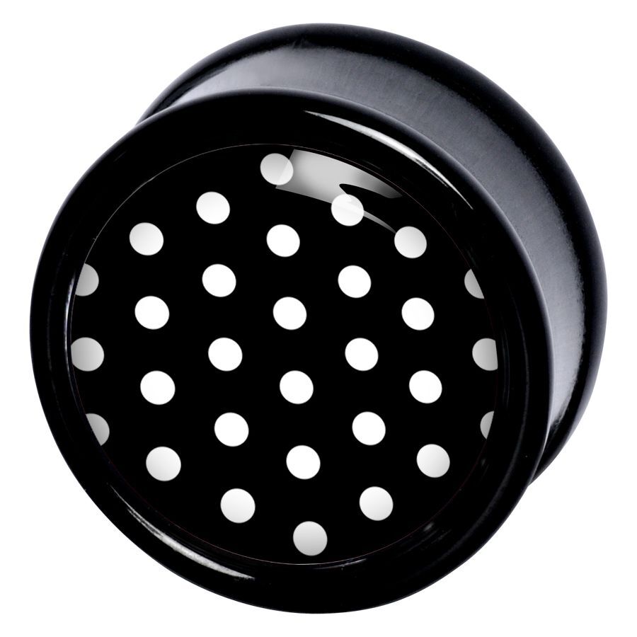 Schwarzer Plug mit weißen Polka Dots Schwarzer PMMA Plug mit weißen Polka Dots auf schwarzem Hintergrund