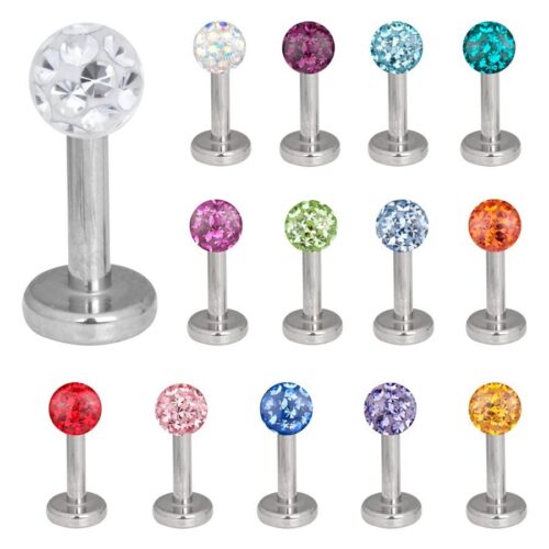 Verschiedene Multi Jewelled Labrets mit bunten Kristallen auf weißem Hintergrund