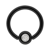 Schwarzer Titan Clip in Ring mit klarem Kristall Schwarzer Titanring mit klarem Kristall auf weißem Hintergrund