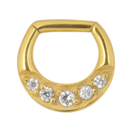Goldener Septum Clicker mit fünf klaren Kristallen auf weißem Hintergrund