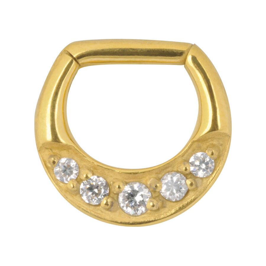 Goldener Septum Clicker mit fünf klaren Kristallen auf weißem Hintergrund