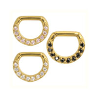 Drei goldene Septum Clicker mit schwarzen und klaren Kristallen auf weißem Hintergrund