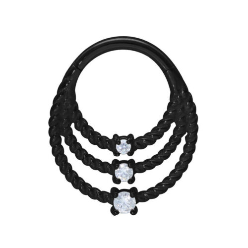 Dreifacher schwarzer Twisted Ring mit klaren Kristallen auf weißem Hintergrund
