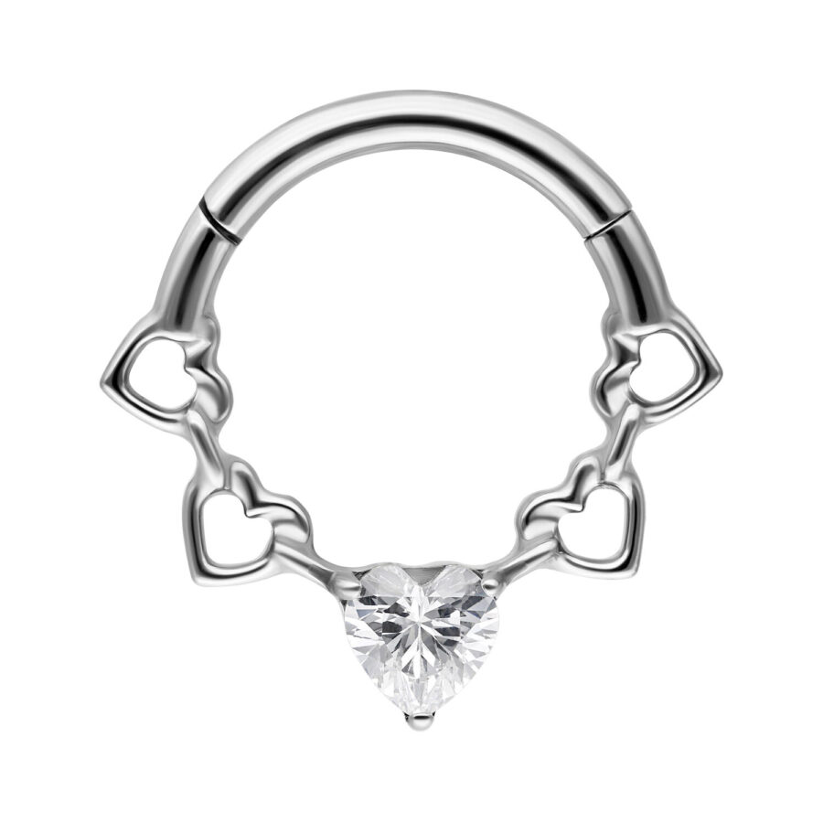 Silberner Septum Clicker mit Herz- und Kristalldetails auf weißem Hintergrund