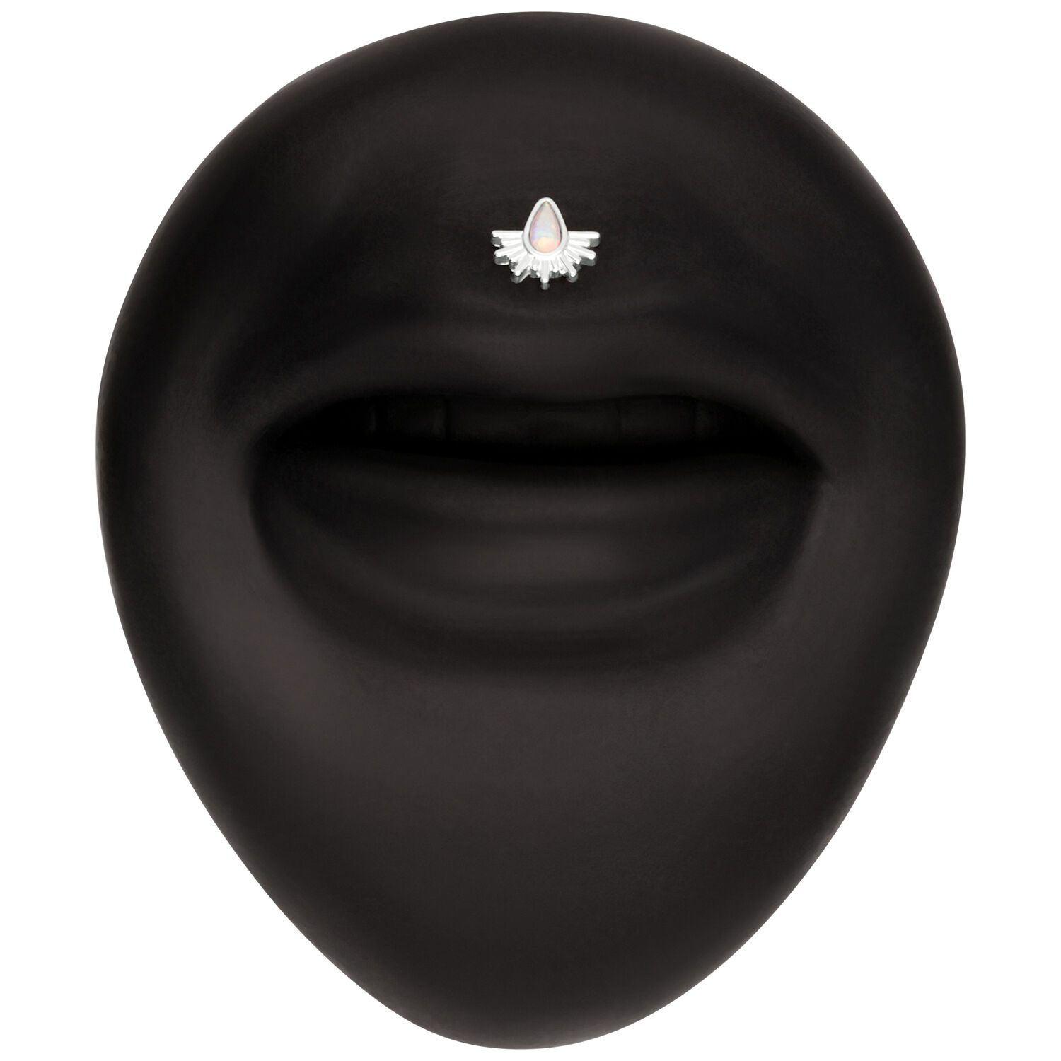 Schwarzer Hintergrund mit einem kleinen, weißen Aufsatz in Form von Sonnenstrahlen, verziert mit einem opalisierenden Stein.